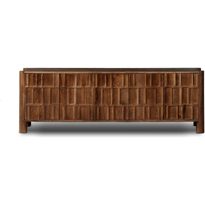 Ezri Media Console by Four Hands in cocoa oak, carved cocoa oak. Made from solid oak in a unique style.