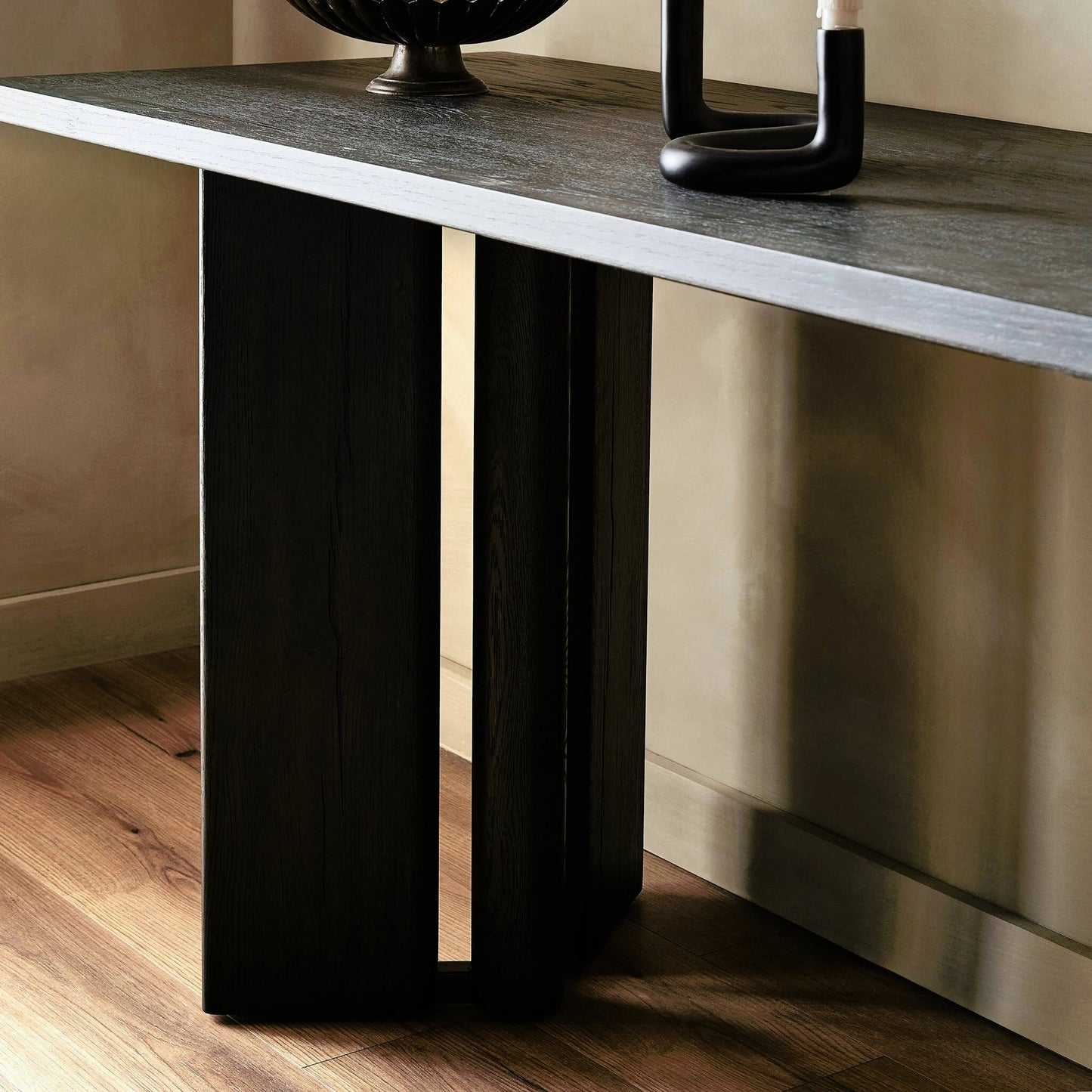 012 SI-2158205 | Closeup | Huxley Console Table by Four Hands in smoked black veneer. Made from thick oak veneer, engineered hardwood in a modern style.