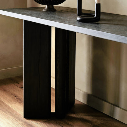 Huxley Console Table by Four Hands in smoked black veneer. Made from thick oak veneer, engineered hardwood in a modern style.