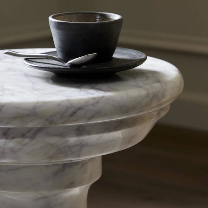 Cyprus End Table by Four Hands in veined white marble solid. Made from solid marble in a modern style.