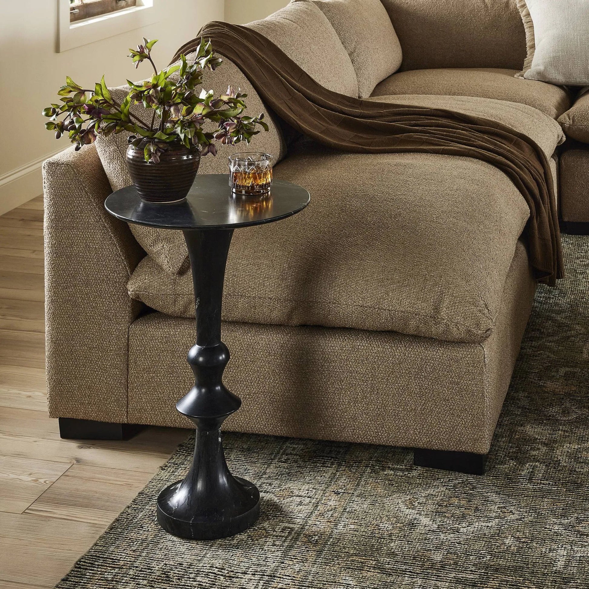 Polli End Table by Four Hands in black marble. Made from solid marble in a modern style.