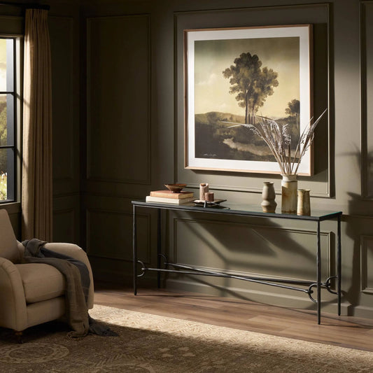 Babylon Console Table by Four Hands in tempered glass, hammered gunmetal. Made from tempered glass, iron in a unique style.