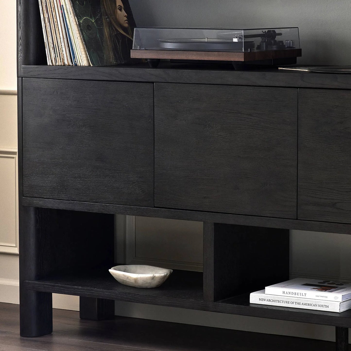 017 SI-2257120 | Closeup | Noeline Wide Bookcase by Four Hands in smoked black oak, smoked black oak veneer. Made from solid oak, engineered hardwood, thick oak veneer in a modern style.