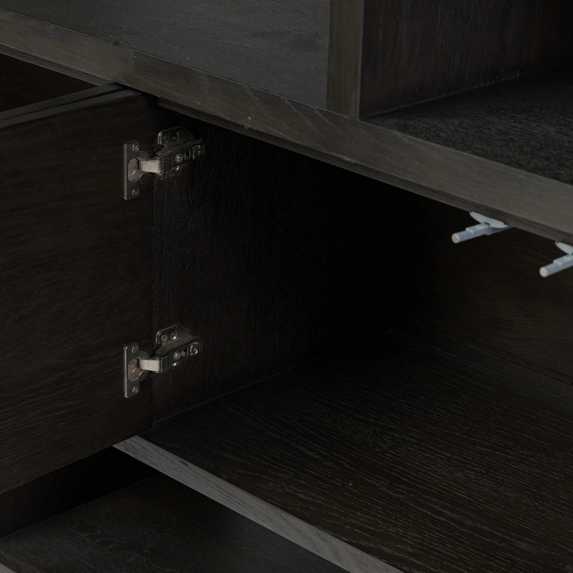 Noeline Wide Bookcase by Four Hands in smoked black oak, smoked black oak veneer. Made from solid oak, engineered hardwood, thick oak veneer in a modern style.