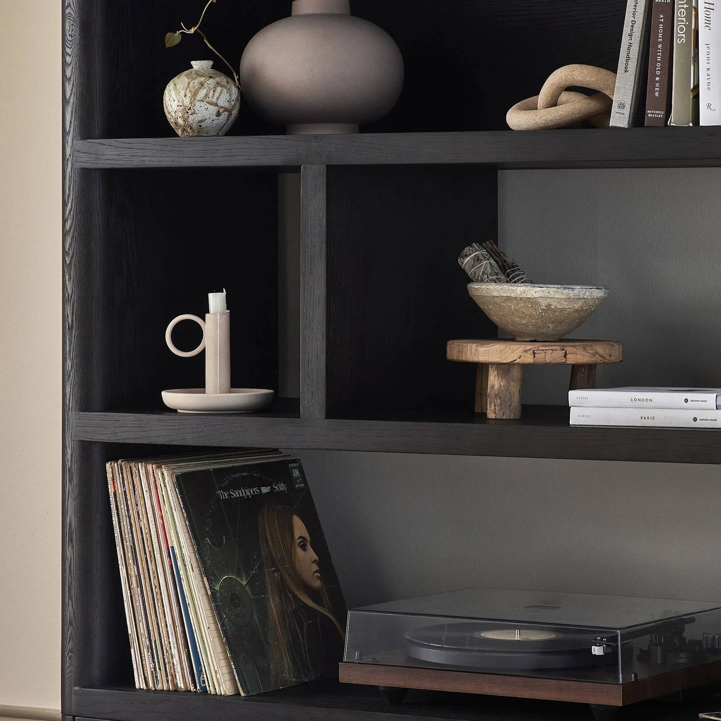 016 SI-2257120 | Closeup | Noeline Wide Bookcase by Four Hands in smoked black oak, smoked black oak veneer. Made from solid oak, engineered hardwood, thick oak veneer in a modern style.
