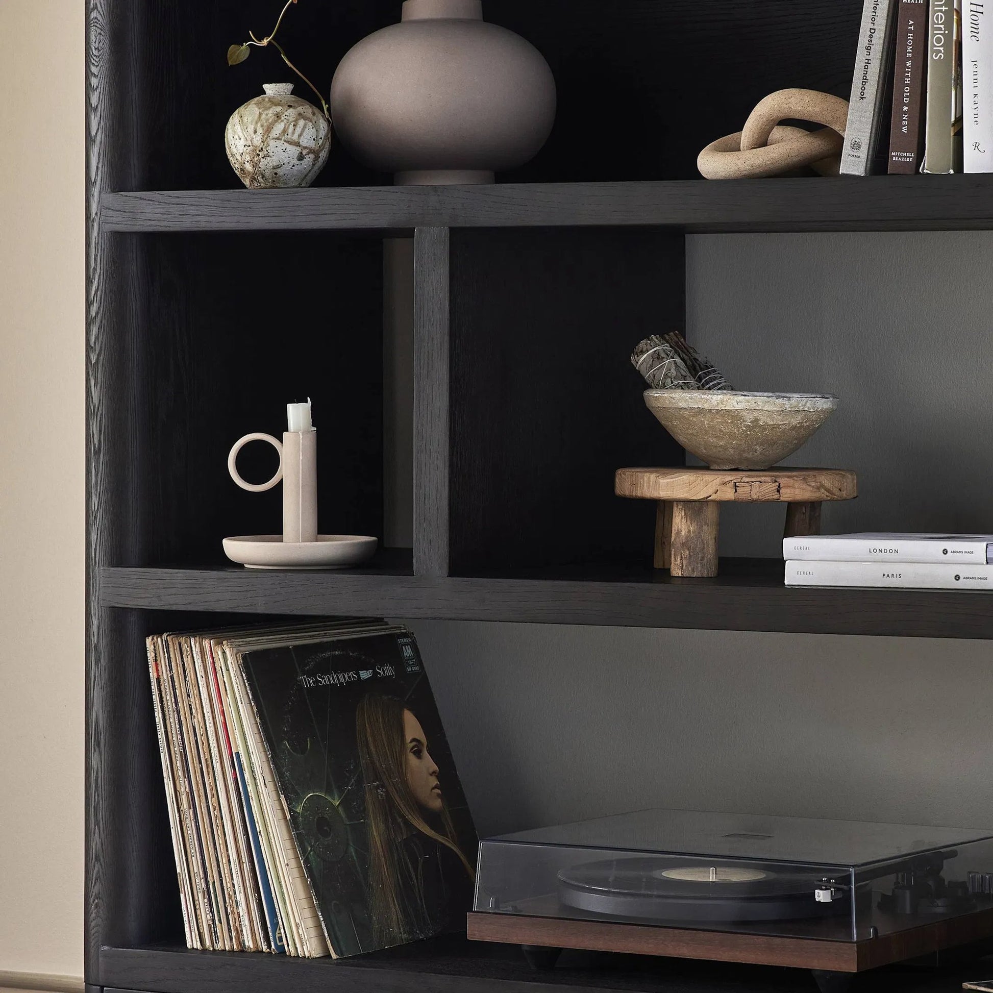 Noeline Wide Bookcase by Four Hands in smoked black oak, smoked black oak veneer. Made from solid oak, engineered hardwood, thick oak veneer in a modern style.