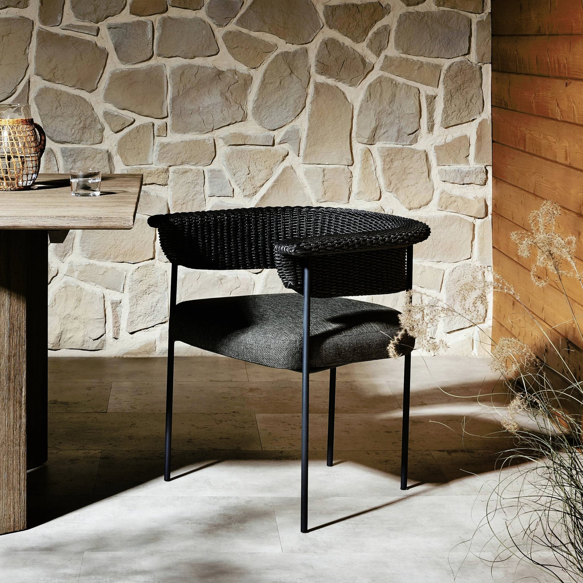 Carrie Outdoor Dining Chair by Four Hands. Made from 100% olefin, iron, 100% polyethylene in a modern style.