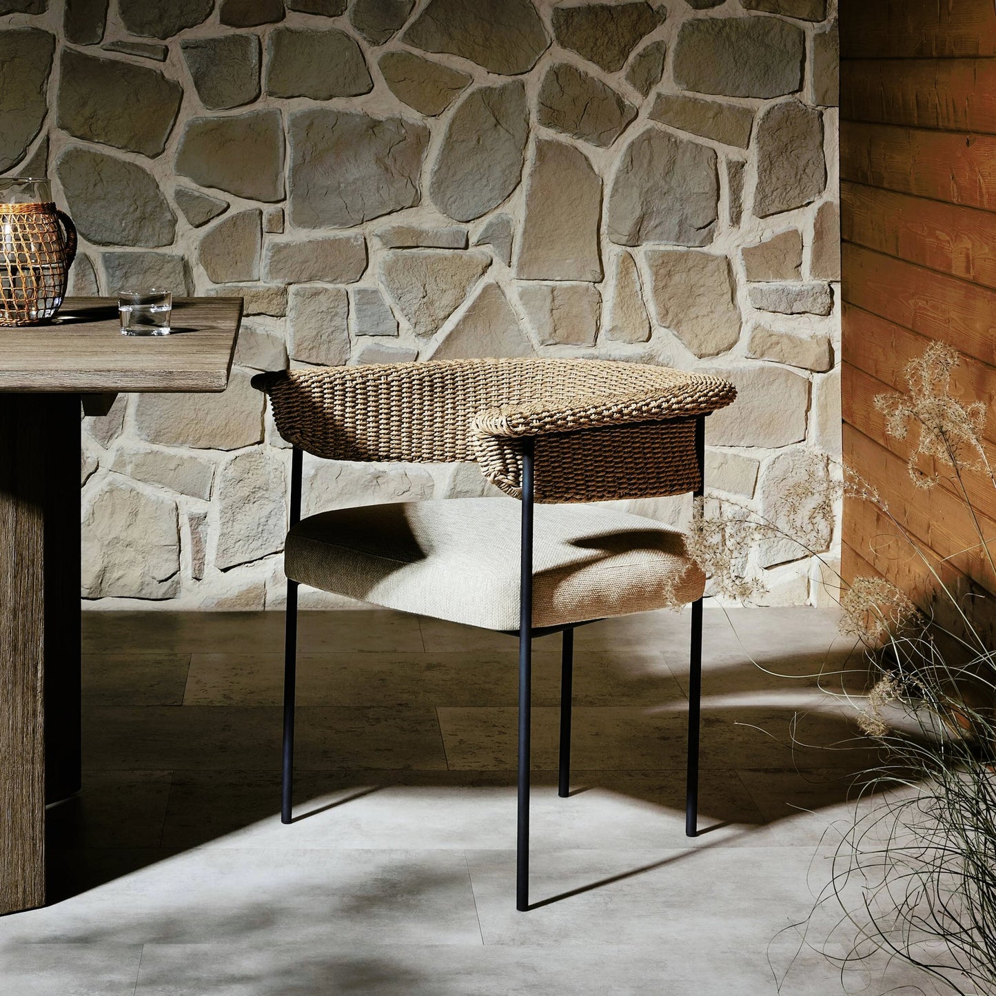 026 SI-2158102 | Lifestyle | Carrie Outdoor Dining Chair by Four Hands. Made from 100% olefin, iron, 100% polyethylene in a modern style.
