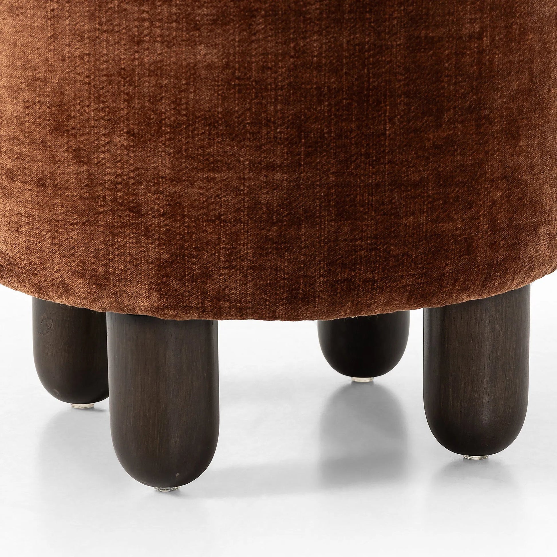 Zena Ottoman by Four Hands. Made from 100% polyester, solid parawood, 50% viscose, 50% wool in a transitional style.