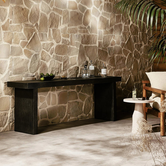 Huesca Outdoor Console Table by Four Hands in distressed graphite concrete. Made from concrete in a modern style.