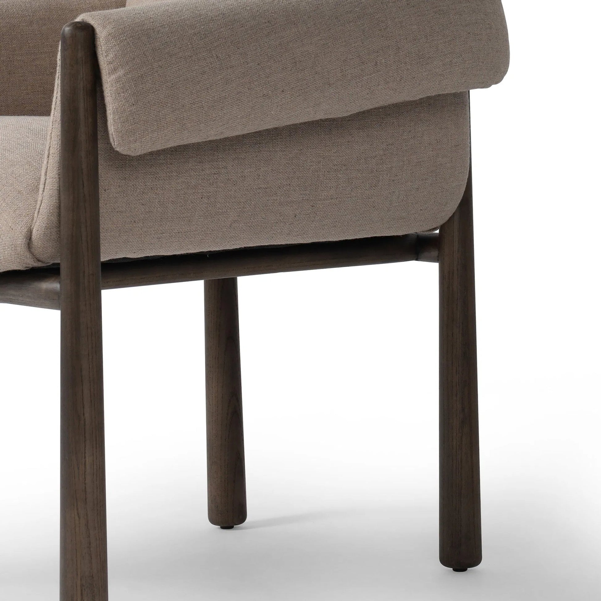 Olia Dining Chair by Four Hands in alcala taupe, warm nettlewood. Made from 70% polyester, 20% viscose (rayon), 10% flax/linen, solid nettlewood, eucalyptus plywood in a transitional style.