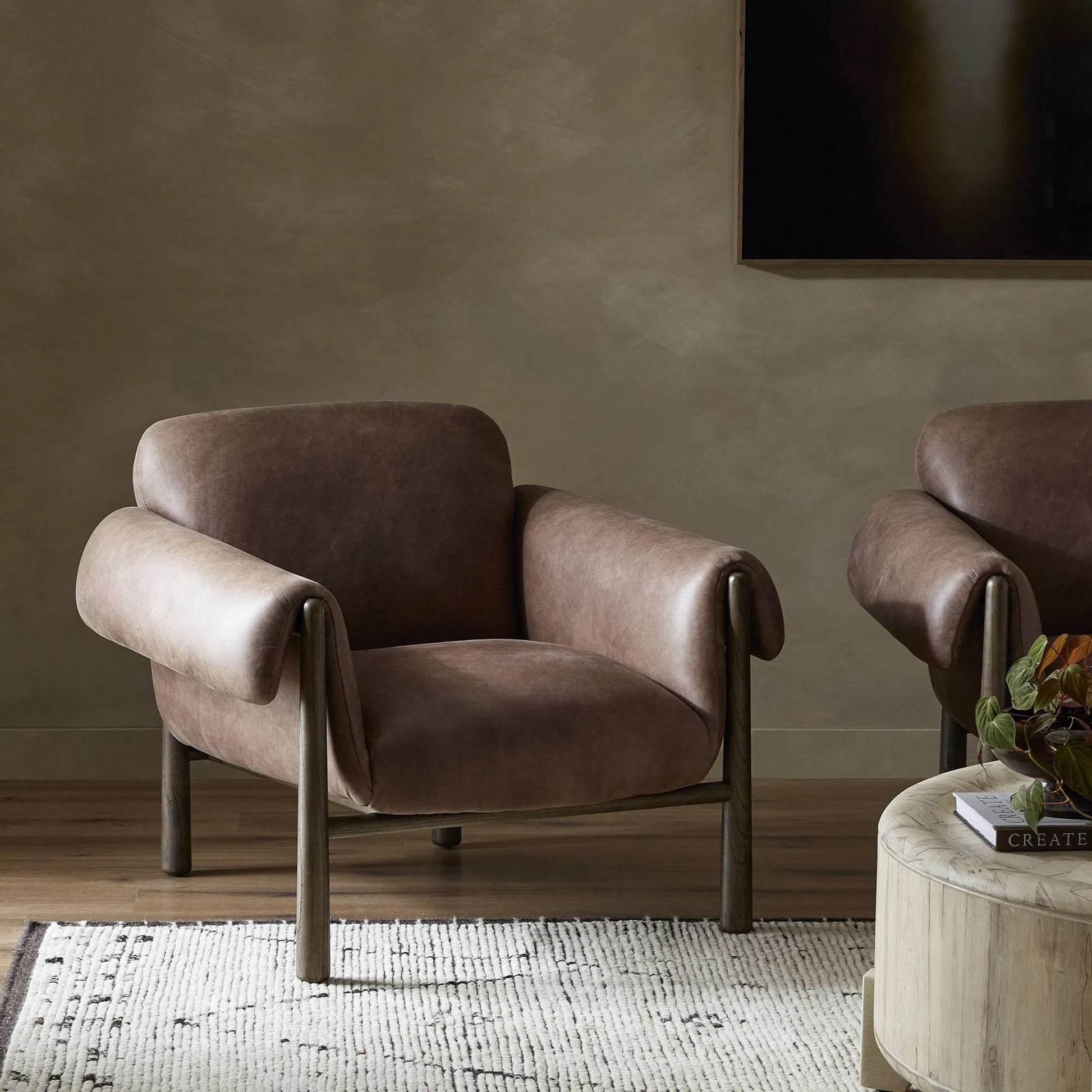 Olia Chair by Four Hands in palermo cigar, warm nettlewood. Made from top grain leather, solid nettlewood in a transitional style.