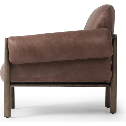 Olia Chair by Four Hands in palermo cigar, warm nettlewood. Made from top grain leather, solid nettlewood in a transitional style.