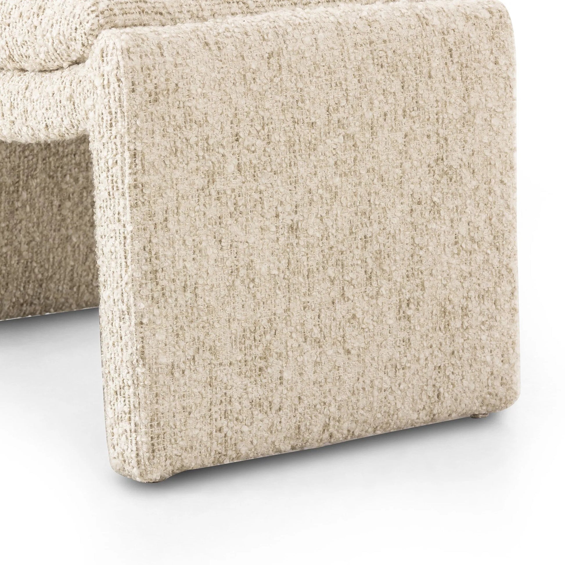 Daniel Ottoman by Four Hands in ivan sand. Made from 60% acrylic, 33% cotton, 7% polyester in a transitional style.