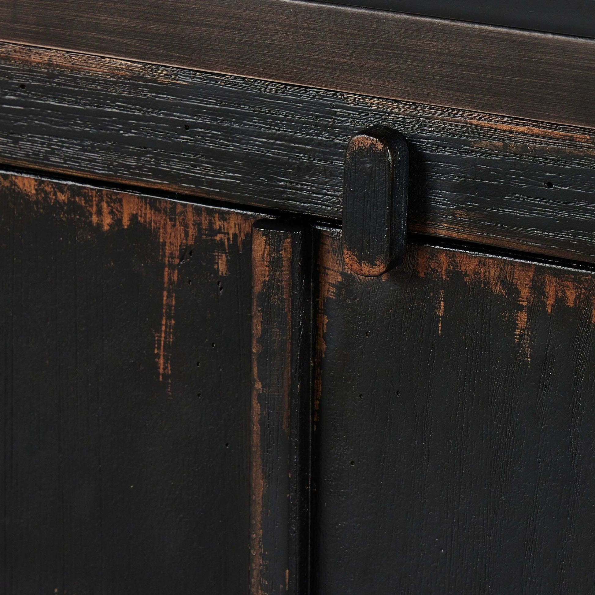 The Humptulips River Moonshine Cabinet by Four Hands in distressed burnt black. Made from pine veneer, solid pine in a modern style.