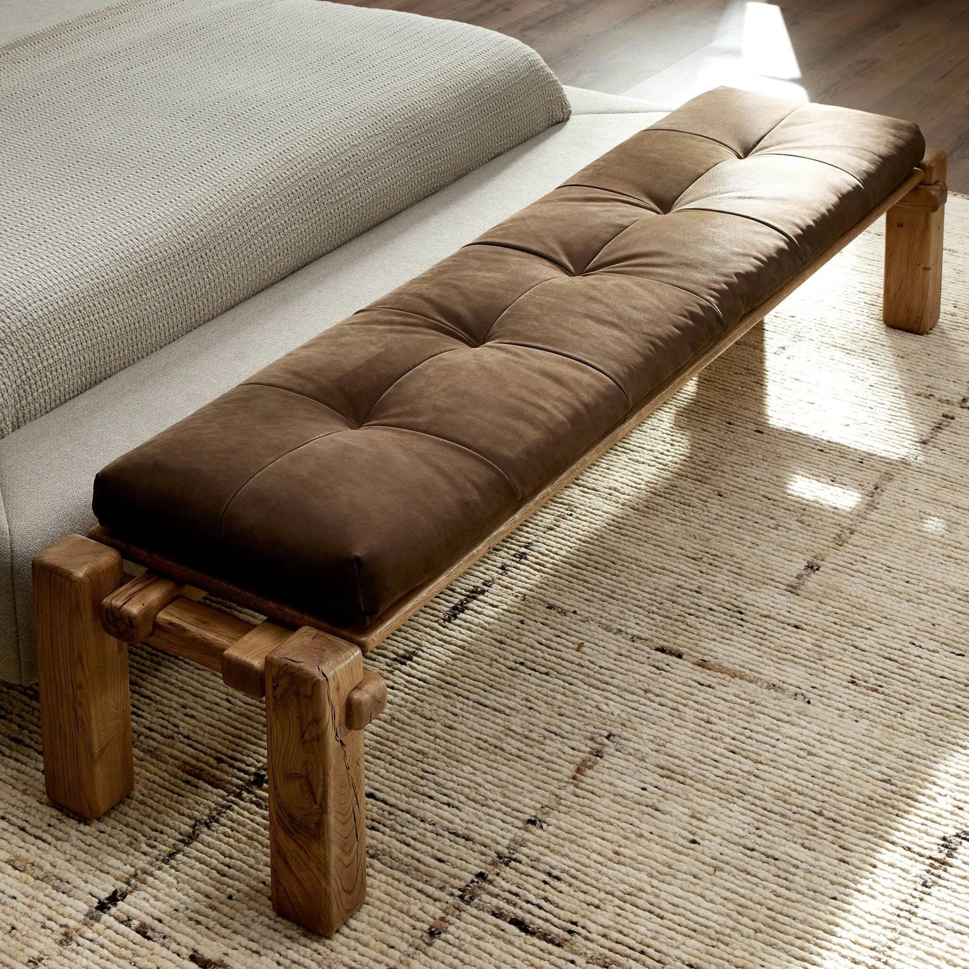 Marcia Accent Bench by Four Hands in nubuck cigar and natural reclaimed french oak. Made from top grain leather, solid reclaimed oak, 95% polyurethane foam, 5% fiber in a modern style.