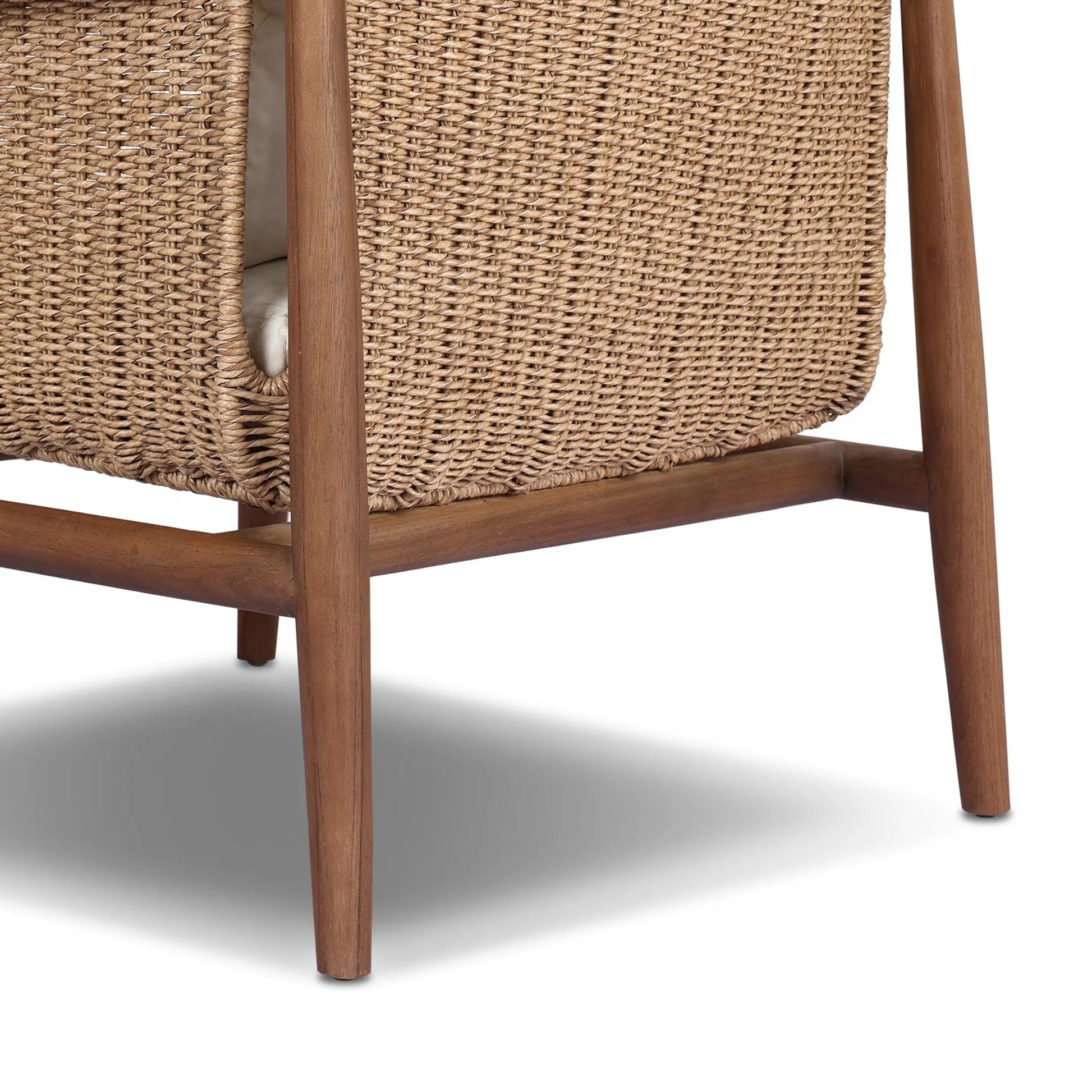 Cambrie Outdoor Chair by Four Hands in arashi salt, stained toasted brown, faux hyacinth. Made from 100% acrylic, solid teak, 100% polyethylene in a rustic style.