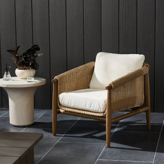 Cambrie Outdoor Chair by Four Hands in arashi salt, stained toasted brown, faux hyacinth. Made from 100% acrylic, solid teak, 100% polyethylene in a rustic style.