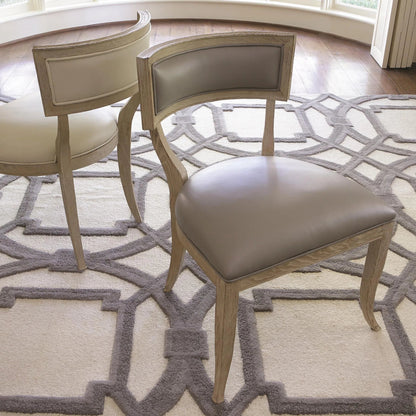 Klios Chair by Global Views. Made from american white oak in a transitional style.
