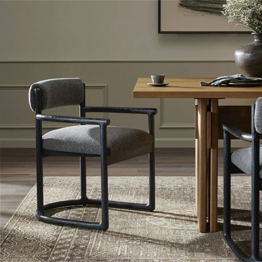 Clarice Dining Chair by Four Hands in thames ash, brushed ebony. Made from 66% polyester, 19% acrylic, 15% flax/linen, solid nettlewood in a unique style.