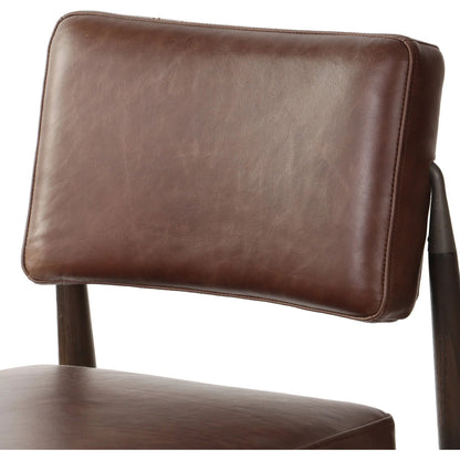 Anton Bar Stool by Four Hands in havana brown, burnt oak, raw iron. Made from top grain leather, solid oak, iron in a modern style.