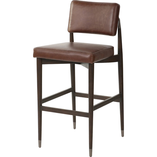 Anton Bar Stool by Four Hands in havana brown, burnt oak, raw iron. Made from top grain leather, solid oak, iron in a modern style.