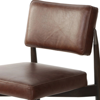 Anton Counter Stool by Four Hands in havana brown, burnt oak, raw iron. Made from top grain leather, solid oak, iron in a modern style.