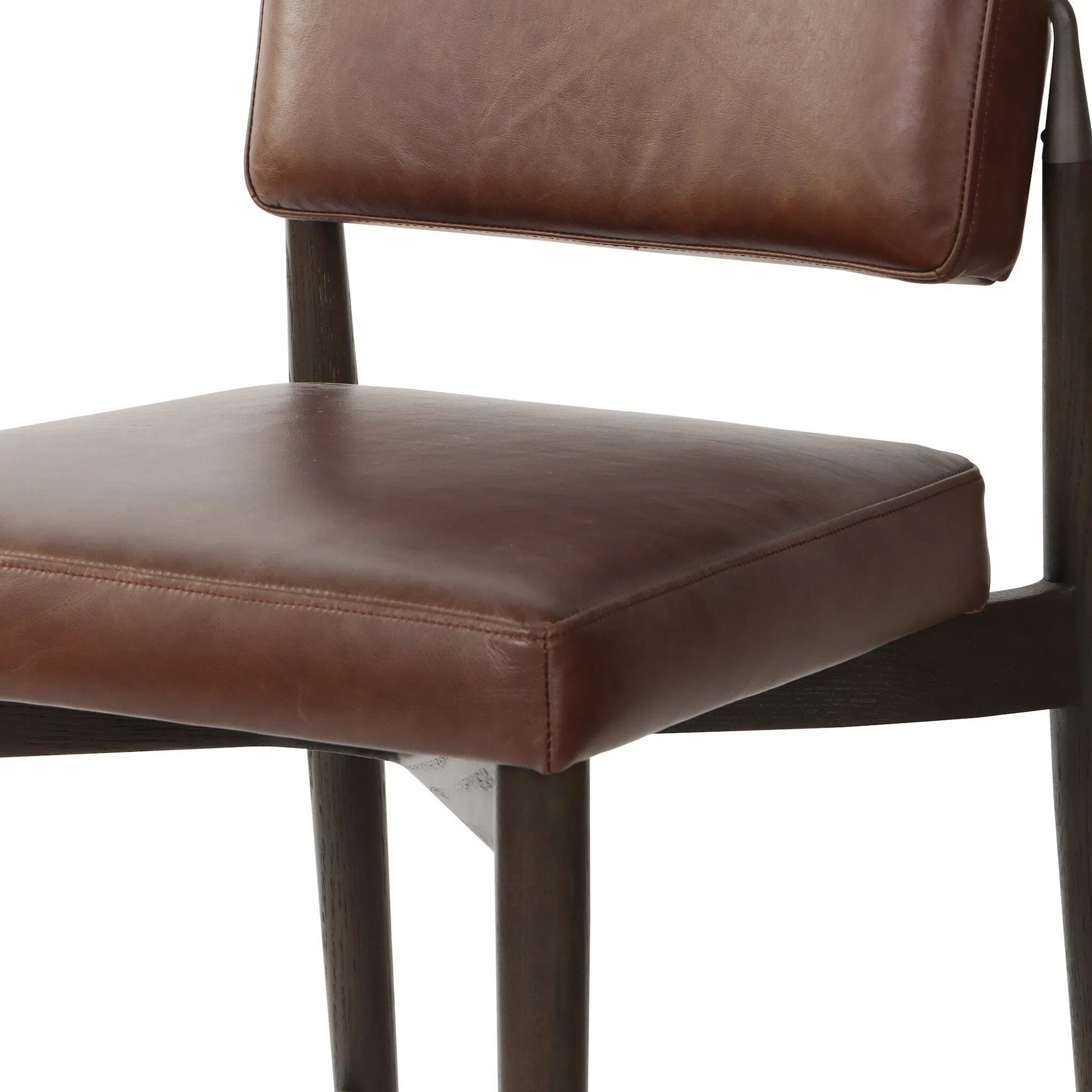 Anton Counter Stool by Four Hands in havana brown, burnt oak, raw iron. Made from top grain leather, solid oak, iron in a modern style.