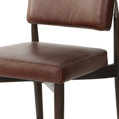 Anton Counter Stool by Four Hands in havana brown, burnt oak, raw iron. Made from top grain leather, solid oak, iron in a modern style.
