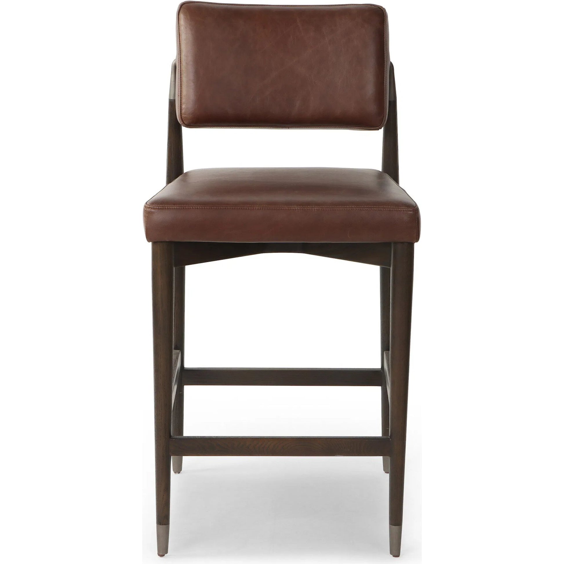 Anton Counter Stool by Four Hands in havana brown, burnt oak, raw iron. Made from top grain leather, solid oak, iron in a modern style.
