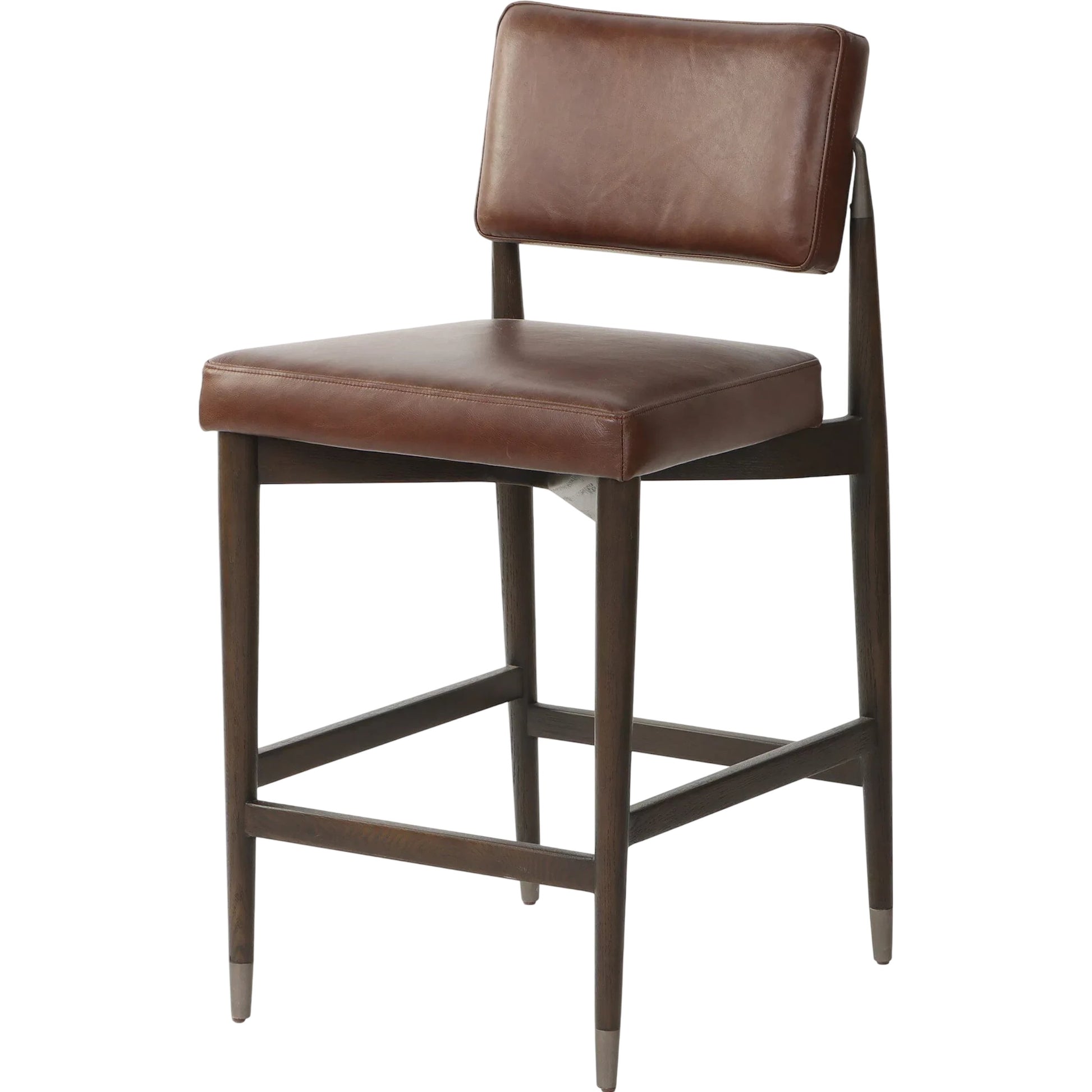 Anton Counter Stool by Four Hands in havana brown, burnt oak, raw iron. Made from top grain leather, solid oak, iron in a modern style.