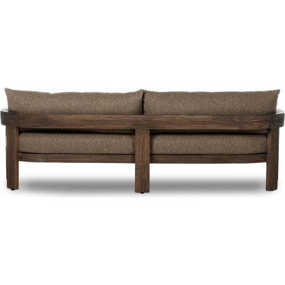 Jackson Outdoor Sofa by Four Hands. Made from 100% olefin, solid fsc®-certified teak, 91% polyurethane foam pad, 9% polyester fiber batting in a modern style.