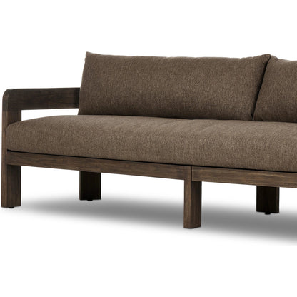 Jackson Outdoor Sofa by Four Hands. Made from 100% olefin, solid fsc®-certified teak, 91% polyurethane foam pad, 9% polyester fiber batting in a modern style.