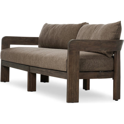 Jackson Outdoor Sofa by Four Hands. Made from 100% olefin, solid fsc®-certified teak, 91% polyurethane foam pad, 9% polyester fiber batting in a modern style.