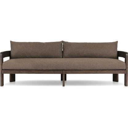 Jackson Outdoor Sofa by Four Hands. Made from 100% olefin, solid fsc®-certified teak, 91% polyurethane foam pad, 9% polyester fiber batting in a modern style.
