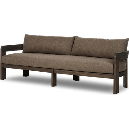 Jackson Outdoor Sofa by Four Hands. Made from 100% olefin, solid fsc®-certified teak, 91% polyurethane foam pad, 9% polyester fiber batting in a modern style.