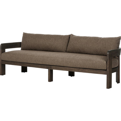 Jackson Outdoor Sofa by Four Hands. Made from 100% olefin, solid fsc®-certified teak, 91% polyurethane foam pad, 9% polyester fiber batting in a modern style.