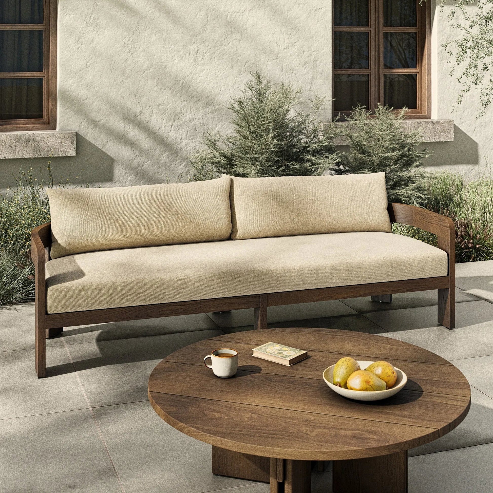 Jackson Outdoor Sofa by Four Hands. Made from 100% olefin, solid fsc®-certified teak, 91% polyurethane foam pad, 9% polyester fiber batting in a modern style.