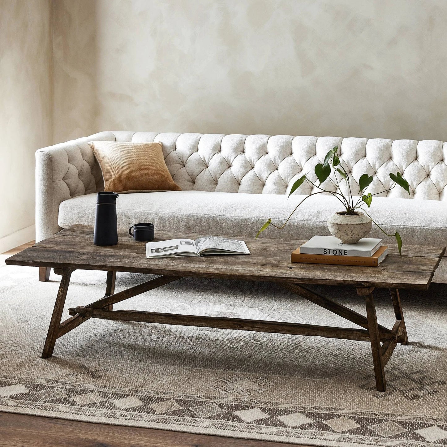 009 SI-2137303 | Lifestyle | Elio Coffee Table by Four Hands in burnt bleached oak. Made from solid oak in a modern style.