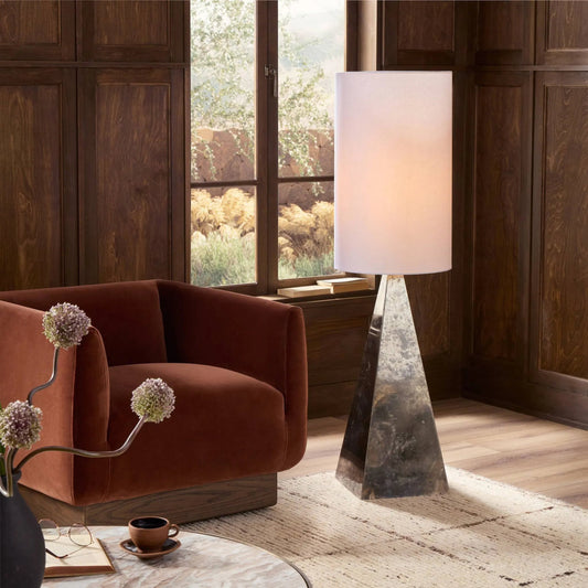 Banner Floor Lamp by Four Hands in oxidized brass steel, black cord, ivory slubbed linen. Made from stainless steel, thermoplastic, 90% polyester, 10% cotton in a unique style.