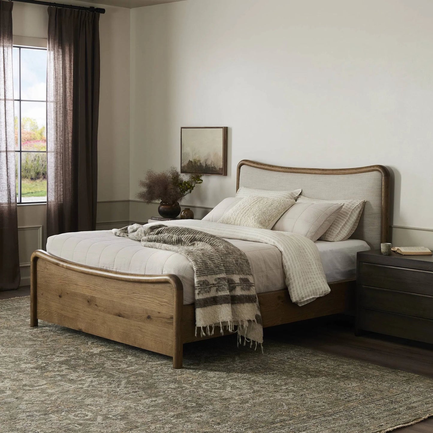 012 SI-2519154 | Lifestyle | Dover Bed by Four Hands in hockney linen, rustic amber oak veneer. Made from 86% polyester, 14% flax/linen, thick oak veneer, solid oak in a transitional style.