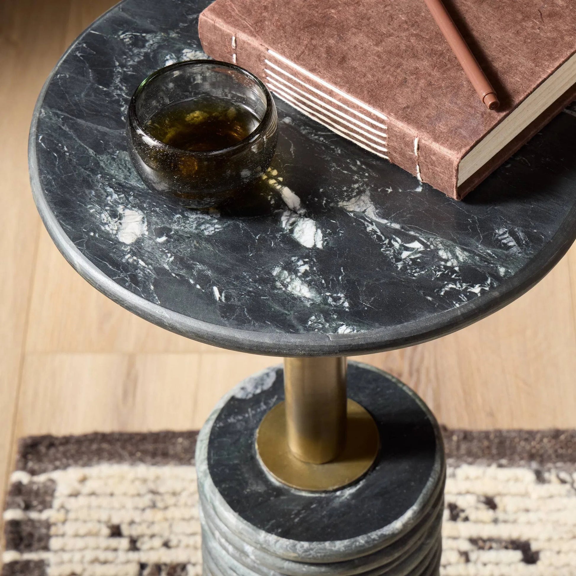 Reeves End Table by Four Hands. Made from solid marble, iron in a modern style.