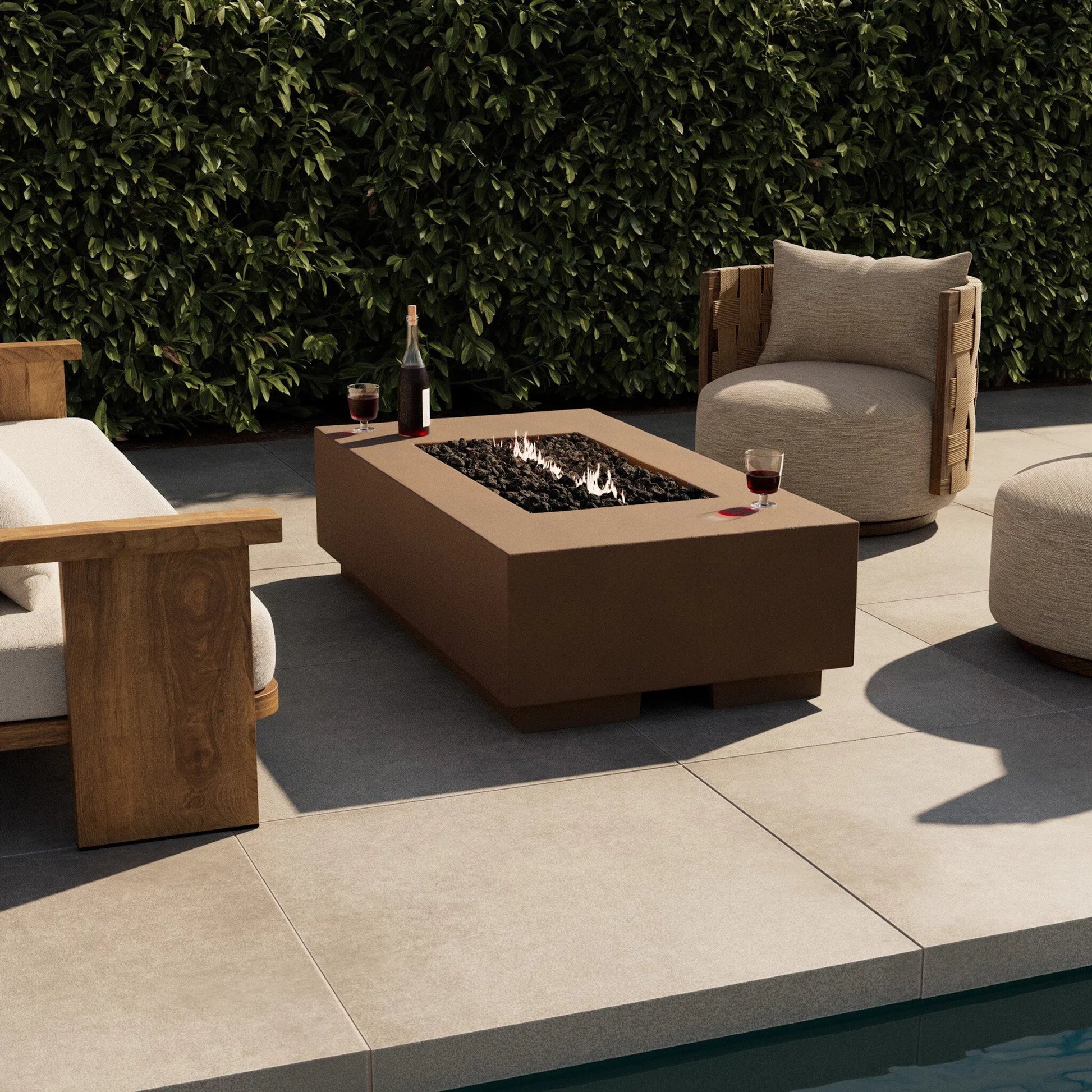 Kenton Outdoor Fire Table by Four Hands. Made from solid concrete in a unique style.