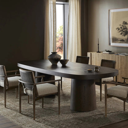 Valen Dining Table by Four Hands in rustic brown oak veneer. Made from oak veneer in a traditional style.