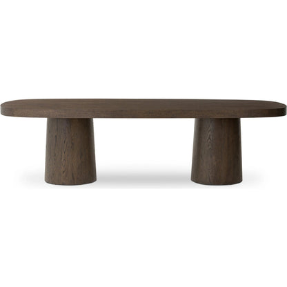 Valen Dining Table by Four Hands in rustic brown oak veneer. Made from oak veneer in a traditional style.