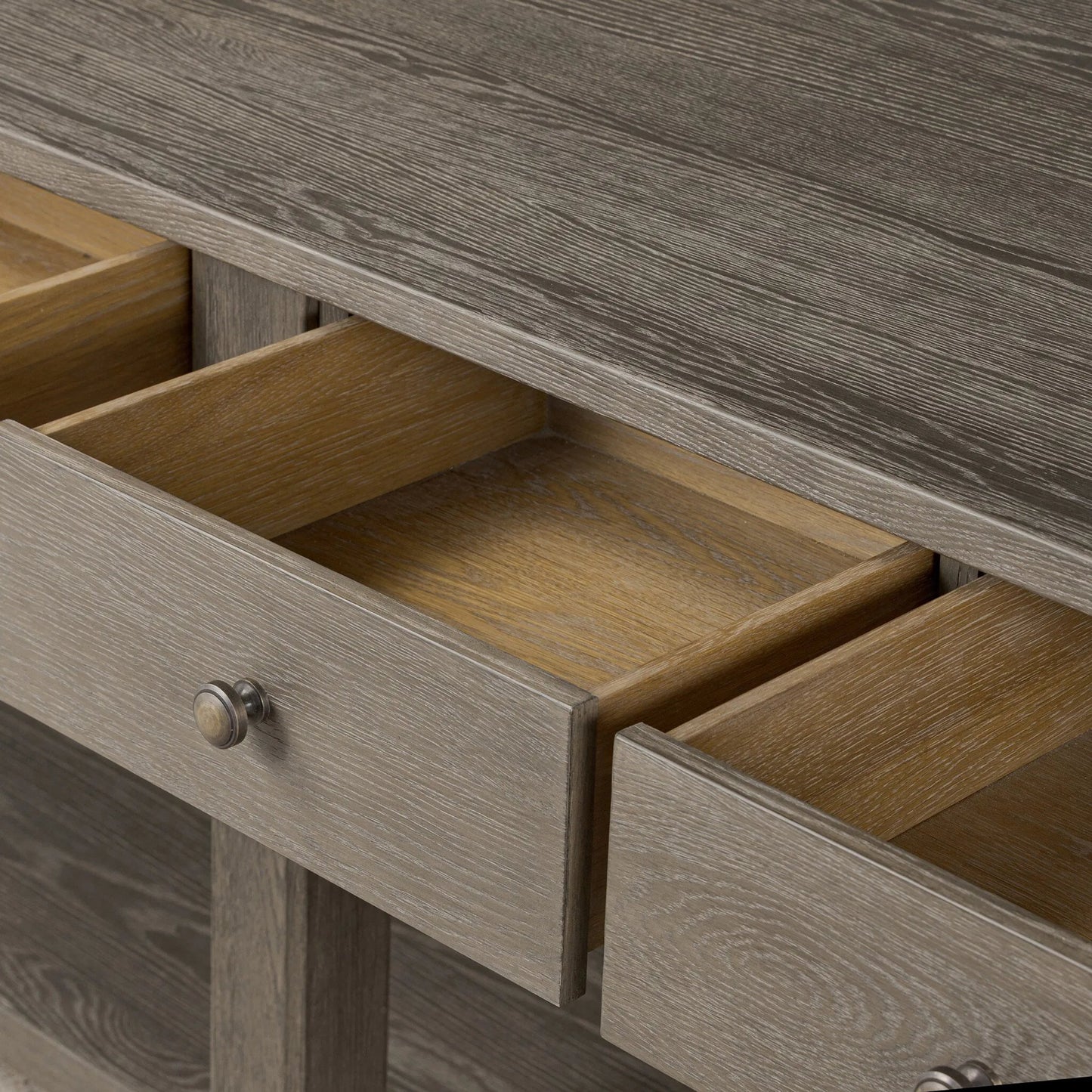 009 SI-2635295 | Closeup | Elise Kitchen Island by Four Hands in weathered hazel oak veneer, dark brass. Made from oak veneer, brass in a unique style.