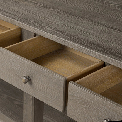 Elise Kitchen Island by Four Hands in weathered hazel oak veneer, dark brass. Made from oak veneer, brass in a unique style.
