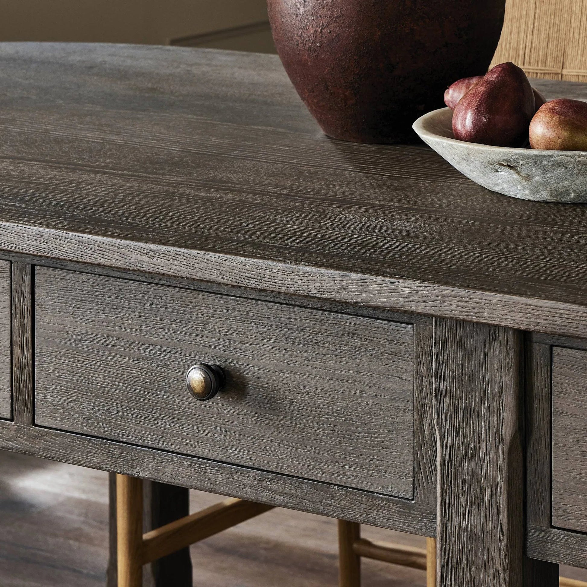 Elise Kitchen Island by Four Hands in weathered hazel oak veneer, dark brass. Made from oak veneer, brass in a unique style.
