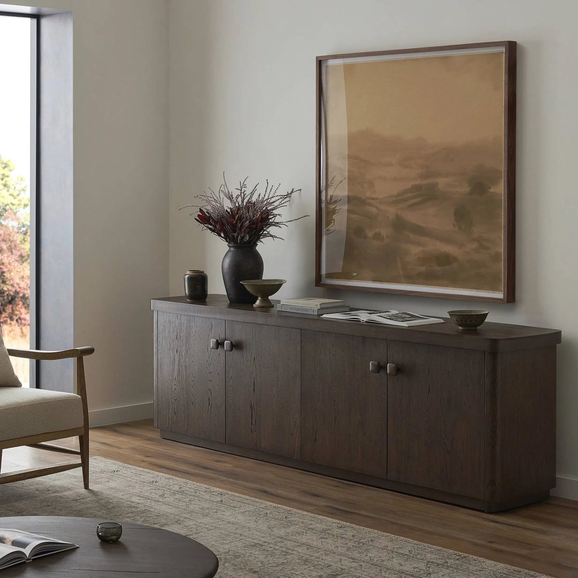 Valen Sideboard by Four Hands in rustic brown oak veneer, rustic brown oak solid. Made from oak veneer, solid oak in a unique style.