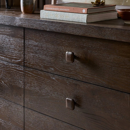 Valen 6 Drawer Dresser by Four Hands in rustic brown oak veneer, rustic brown oak solid. Made from oak veneer, solid oak in a traditional style.